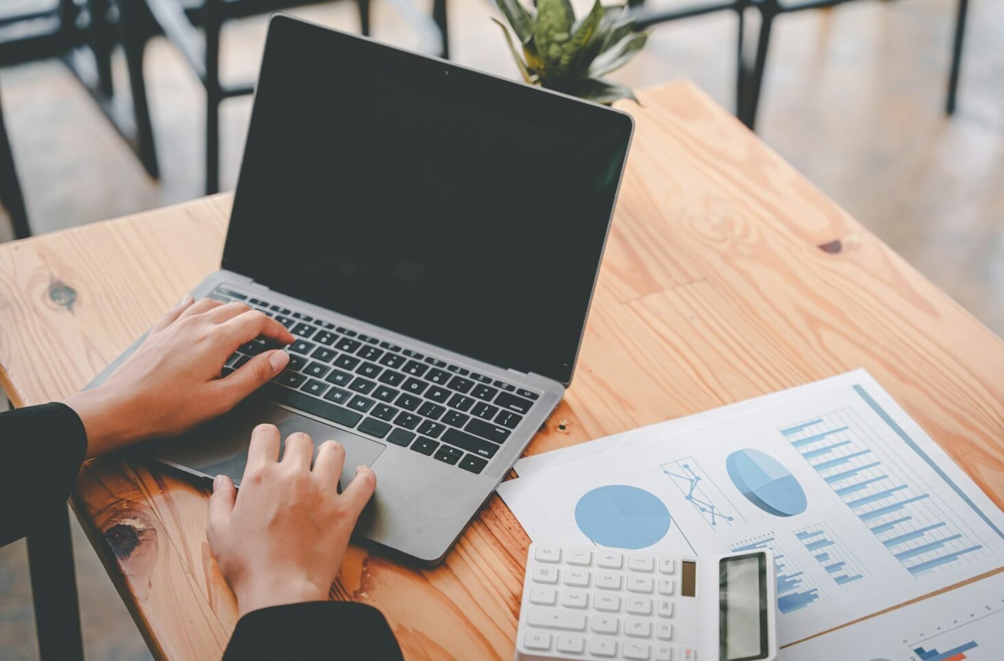 office girl's hands typing input data